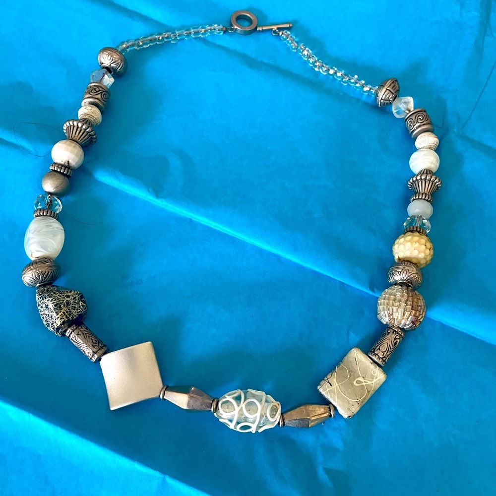 Lovely white and silver colored necklace